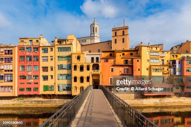 bridge crossing river in gerona spain - catalonia stock pictures, royalty-free photos & images