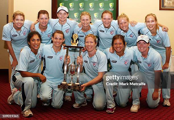 The Breakers celebrate with the winning trophy following victory in the WNCL Final match between the NSW Breakers and the Victoria Spirit at Sydney...