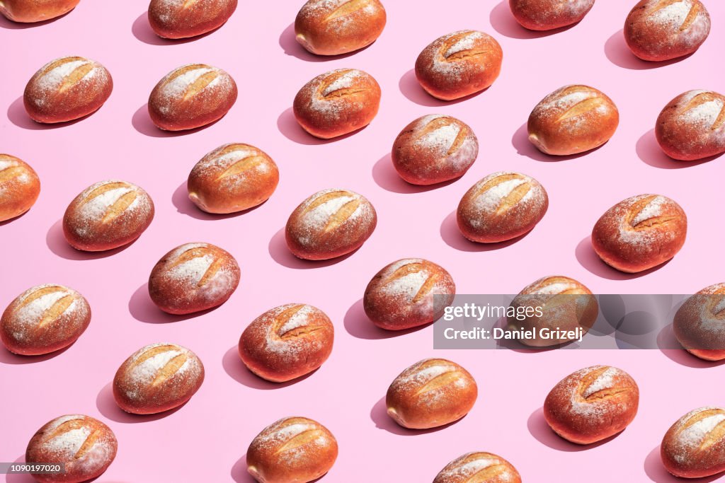 Multiple bread rolls placed in a pattern