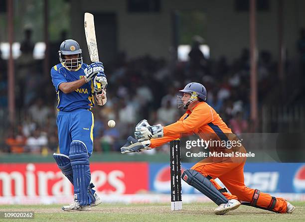 Tillakaratne Dilshan of Sri Lanka watches as Wesley Baressi catches the ball during the Sri Lanka v Netherlands 2011 ICC World Cup Warm Up match at...