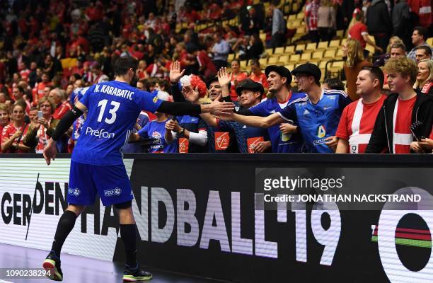 Match winning goal scorer France's Nikola Karabatic celebrate with the fans after the IHF Men's World Championship 2019 handball third place match...
