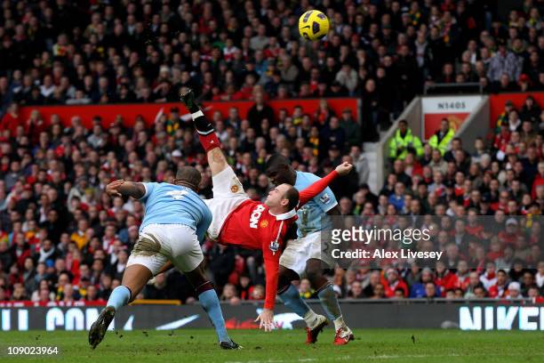 Wayne Rooney of Manchester United scores a goal from an overhead kick during the Barclays Premier League match between Manchester United and...