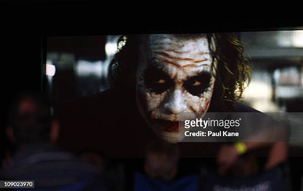 Film goers watch The Dark Knight featuring Heath Ledger during a public tribute outdoor movie night to the late actor at Burswood Park on February...