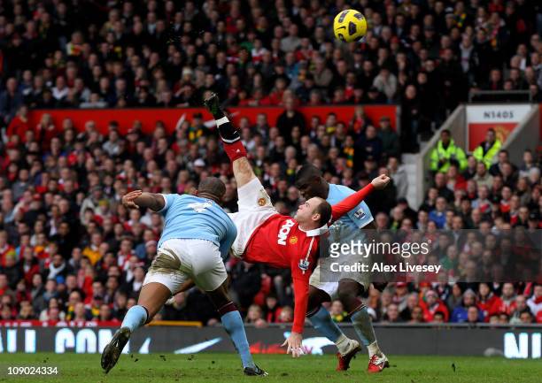 Wayne Rooney of Manchester United scores a goal from an overhead kick during the Barclays Premier League match between Manchester United and...