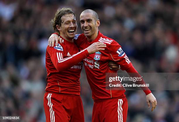 Raul Meireles of Liverpool celebrates scoring the opening goal with team mate Lucas during the Barclays Premier League match between Liverpool and...