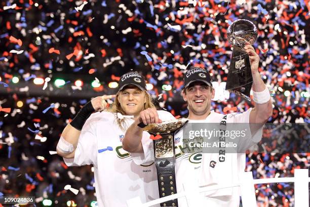 Super Bowl MVP Aaron Rodgers and Clay Matthews of the Green Bay Packers celebrate with the Lombardi Trophy after winning Super Bowl XLV 31-25 against...