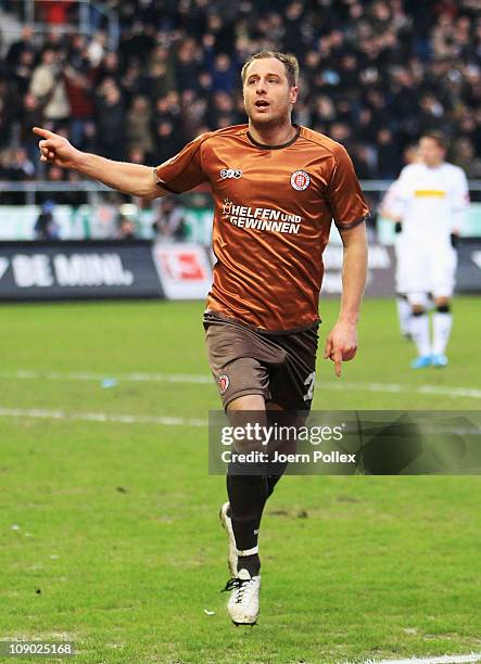 Matthias Lehmann of St.Pauli celebrates after scoring his team's third goal during the Bundesliga match between FC St.Pauli and Borussia...