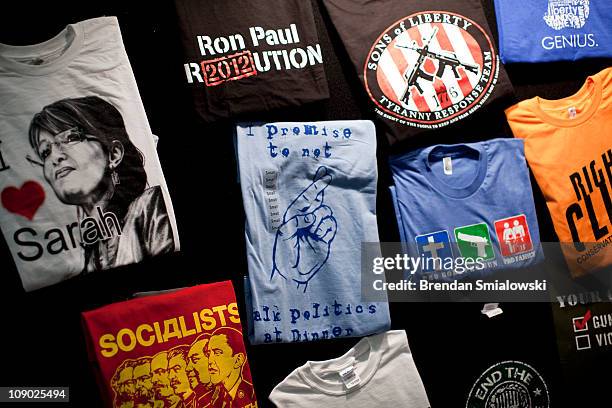 View of t-shirts for sale at an exhibition booth during the final day of the American Conservative Union's Conservative Political Action Conference...