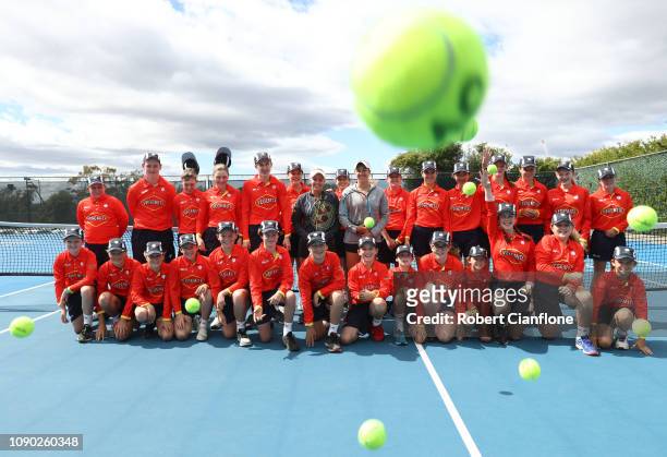 Australian players Ellen Perez and Zoe Hives pose with the ball kids during day two of the 2019 Hobart International at Domain Tennis Centre on...