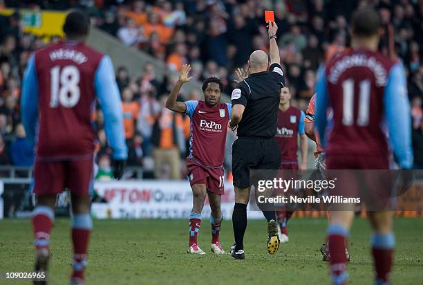 Jean II Makoun of Aston Villa is sent off during the Barclays Premier League match between Blackpool and Aston Villa at Bloomfield Road on February...