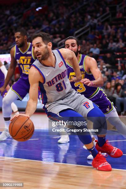 Jose Calderon of the Detroit Pistons tries to get around the defense of Ricky Rubio of the Utah Jazz during the first half at Little Caesars Arena on...