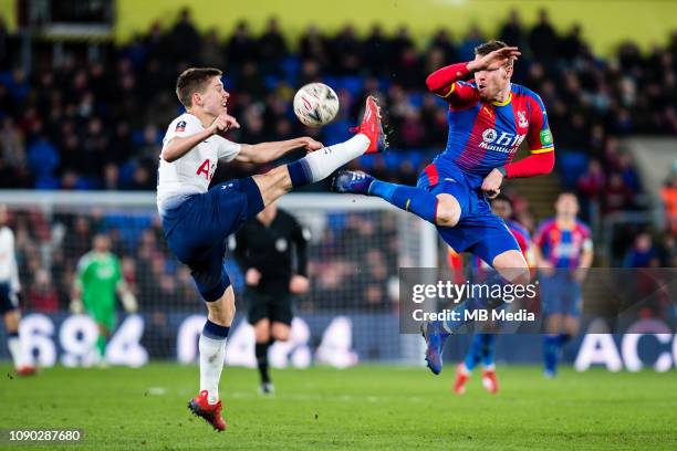 Juan Foyth of Tottenham Hotspur and Connor Wickham of Crystal Palace during the FA Cup Fourth Round match between Crystal Palace and Tottenham...