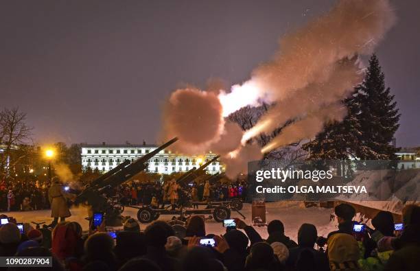 Military personnel fire guns during a salute in memory of the gun fire that marked the end in 1944 of the siege of Leningrad which lasted for 872...