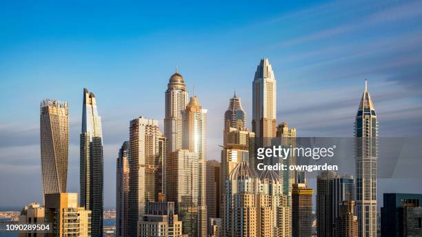 city skyline in dubai - dubai skyline stock pictures, royalty-free photos & images