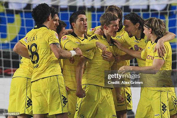 Sven Bender of Dortmund celebrates his team's first goal with team mates during the Bundesliga match between 1. FC Kaiserslautern and Borussia...