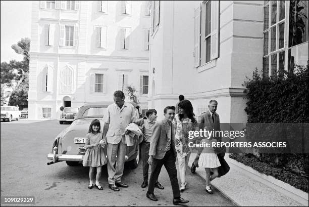 Elizabeth Taylor, Richard Burton and their children Michael, Christopher, Elisabeth and Maria while on vacation on the French Riviera in 1965.