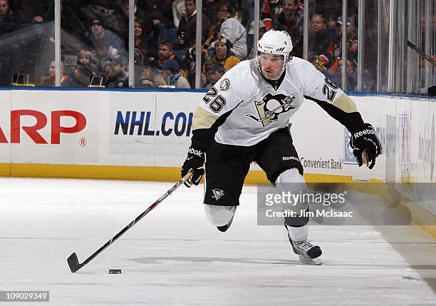 Eric Tangradi of the Pittsburgh Penguins skates against the New York Islanders on February 11, 2011 at Nassau Coliseum in Uniondale, New York. The...