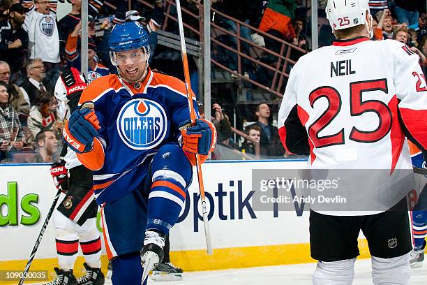 Andrew Cogliano of the Edmonton Oilers celebrates his first period goal against the Ottawa Senators at Rexall Place on February 12, 2011 in Edmonton,...