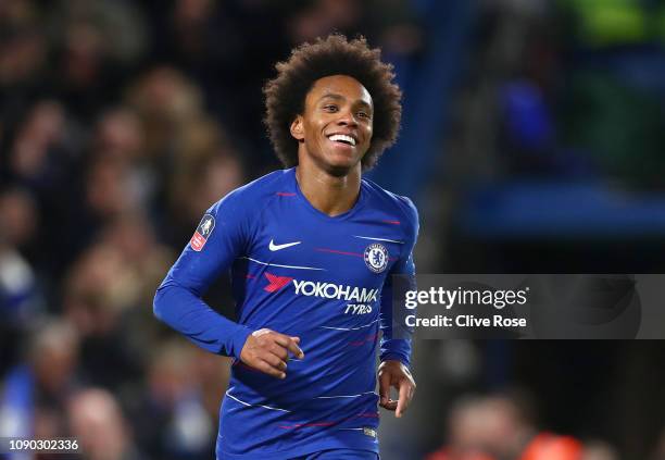 Willian of Chelsea celebrates after scoring his team's third goal during the FA Cup Fourth Round match between Chelsea and Sheffield Wednesday at...