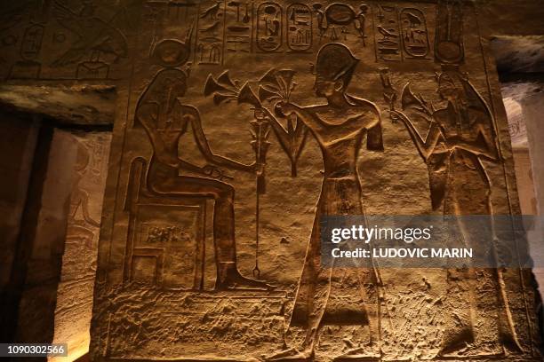 Picture taken on January 27 shows hieroglyphs and statues at the Great Temple of Ramses II at Abu Simbel, built between 1264-1244 BC, south of Aswan...