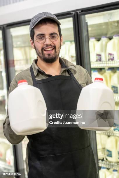 convenience store worker - milkman stock pictures, royalty-free photos & images