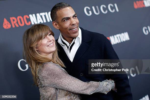 Actress Ellen Pompeo and husband producer Chris Ivery arrive at the Gucci and RocNation Pre-GRAMMY brunch held at Soho House on February 12, 2011 in...