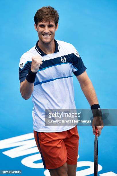 Martin Klizan of Slovakia celebrates after winning a point against Alexei Popyrin of Australia during day one of the 2019 Sydney International at...