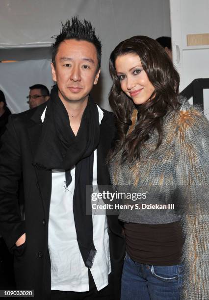 Designer Eric Kim and actress Shannon Elizabeth attend the Mik Cire by Eric Kim Fall 2011 fashion show during Mercedes-Benz Fashion Week at The...