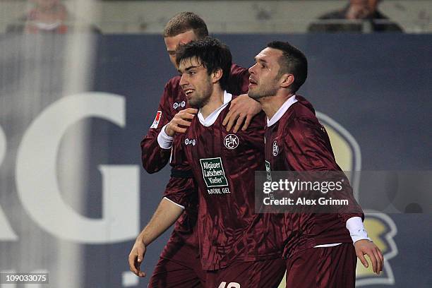 Jan Moravek of Kaiserslautern celebrates his team's first goal with team mate Christian Tiffert during the Bundesliga match between 1. FC...