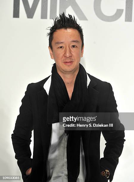 Designer Eric Kim backstage at the Mik Cire by Eric Kim Fall 2011 fashion show during Mercedes-Benz Fashion Week at The Studio at Lincoln Center on...