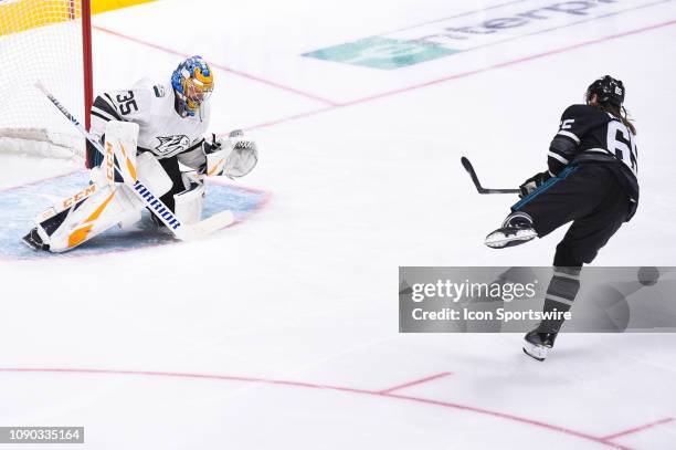 San Jose Sharks defenseman Erik Karlsson scores a goal on Nashville Predators goaltender Pekka Rinne during the NHL All-Star Game at SAP Center on...