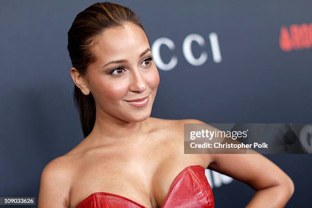 Actress Adrienne Bailon arrives at the Gucci and RocNation Pre-GRAMMY brunch held at Soho House on February 12, 2011 in West Hollywood, California.