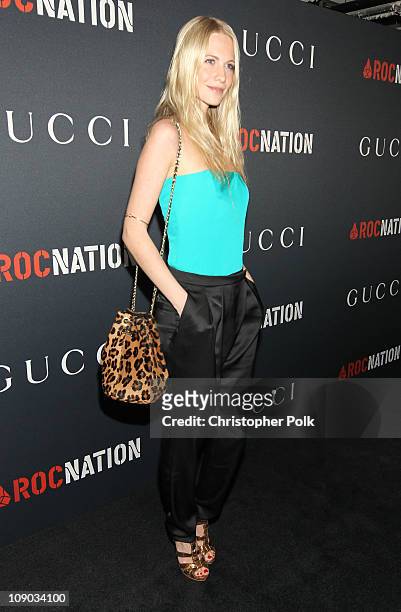 Model Poppy Delvingne arrives at the Gucci and RocNation Pre-GRAMMY brunch held at Soho House on February 12, 2011 in West Hollywood, California.