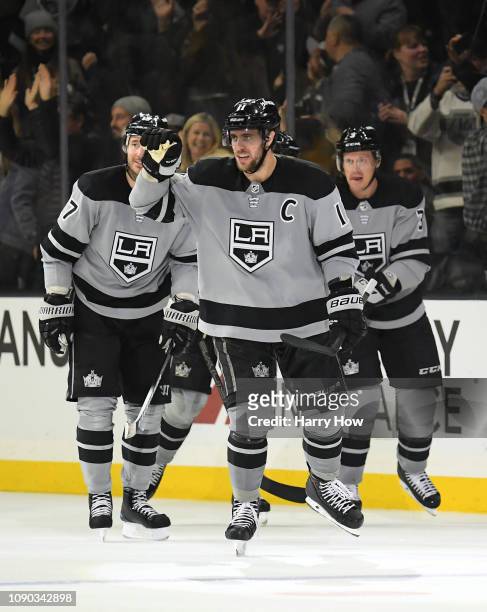 Anze Kopitar of the Los Angeles Kings celebrates his 300th career goal to take a 4-0 lead over the Edmonton Oilers during the third period in a 4-0...