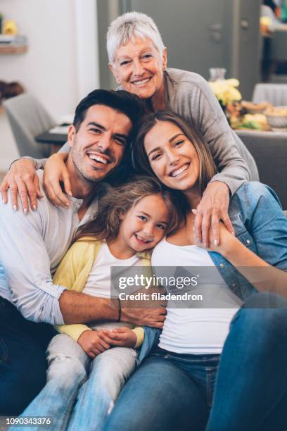 portrait of happy family - grandmother photos stock pictures, royalty-free photos & images