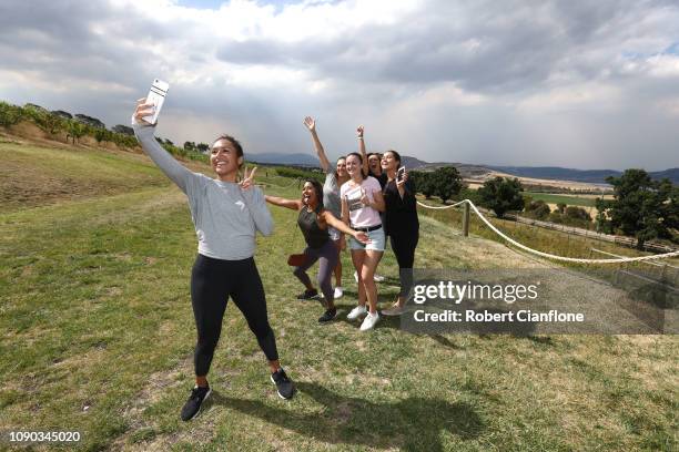 Heather Watson of Great Britain takes a selfie with Sabrina Santamaria, Dalila Jakupovic, Ellen Perez, Isabelle Wallace and Desiree Krawcyk during a...