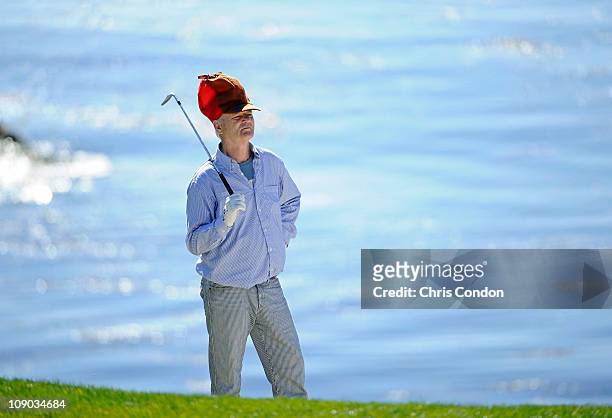 Actor Bill Murray plays from a bunker on the 8th hole during the third round of the AT&T Pebble Beach National Pro-Am at Pebble Beach Golf Links on...