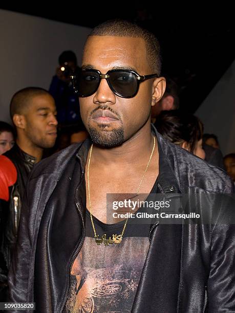 Recording Artist Kanye West attends the Band of Outsiders Fall 2011 fashion show during Mercedes-Benz Fashion Week at SIR Stage on February 12, 2011...