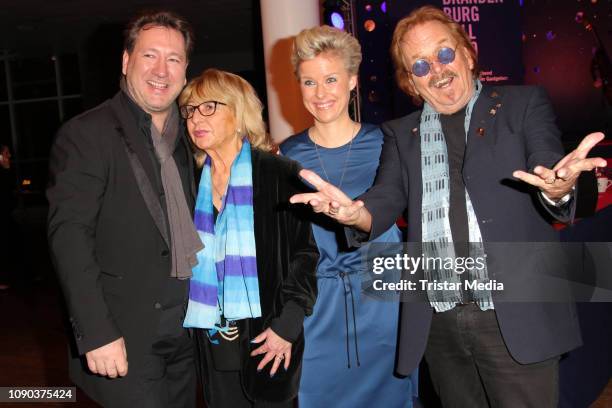 Claudius Dreilich of the band Karat and his wife Belinda Dreilich, Frank Zander and his wife Evi Zander during the Brandenburgball on January 26,...