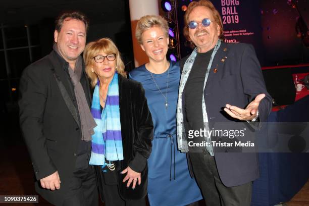 Claudius Dreilich of the band Karat and his wife Belinda Dreilich, Frank Zander and his wife Evi Zander during the Brandenburgball on January 26,...