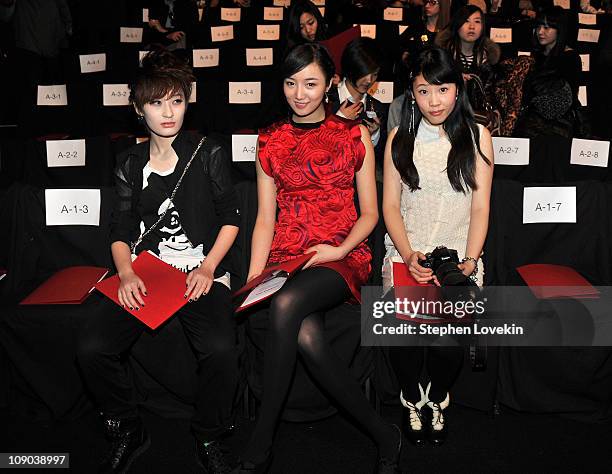 Fashiongoers attend the Vivienne Tam Fall 2011 fashion show during Mercedes-Benz Fashion Week at The Theatre at Lincoln Center on February 12, 2011...