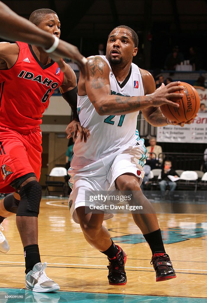 Maureece Rice Maureece Rice of the Sioux Falls Skyforce drives past Armon Johnson ...