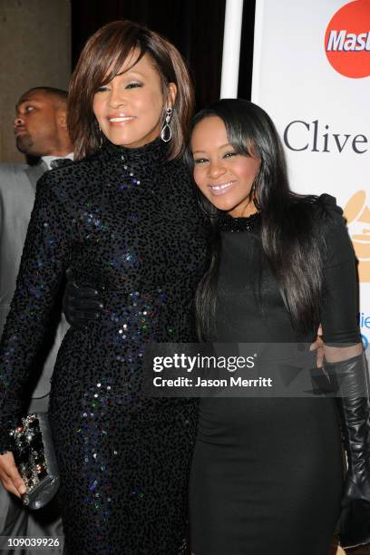 Singer Whitney Houston and Bobbi Kristina Brown arrives at the 2011 Pre-GRAMMY Gala and Salute To Industry Icons Honoring David Geffen at Beverly...