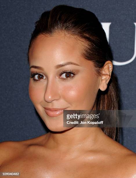 Actress Adrienne Bailon arrives at the Gucci And RocNation Host Pre-Grammy Brunch At Soho House at Soho House on February 12, 2011 in West Hollywood,...