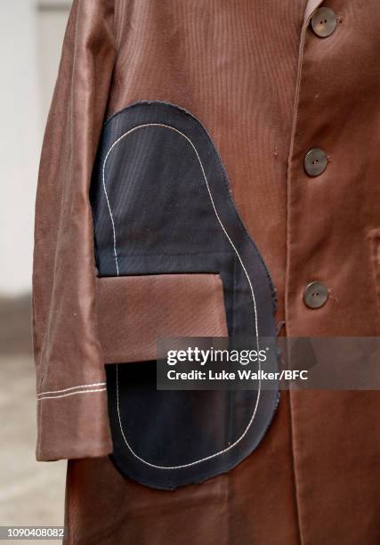 Model, detail, poses at the Omar Afridi presentation at the DiscoveryLAB during London Fashion Week Men's January 2019 at the BFC Designer Showrooms...