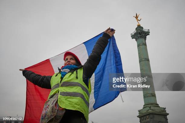 Susanne, a Pâtissière from Grenoble, demonstrates as part of the Womens Gilets Jaunes or Yellow Vest protest at Place de la Bastille on January 6,...