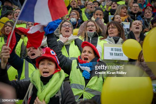 Group of Women Gilets Jaunes or Yellow Vest protest at Place de la Bastille with many waving the French Flag and symbolic Yellow Balloons on January...