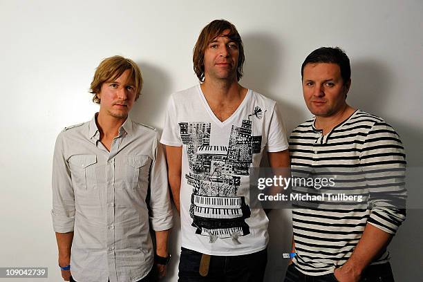 Electronic music group Dirty Vegas poses backstage at the OM Records GRAMMY Party at the Supperclub nightclub on February 12, 2011 in Los Angeles,...