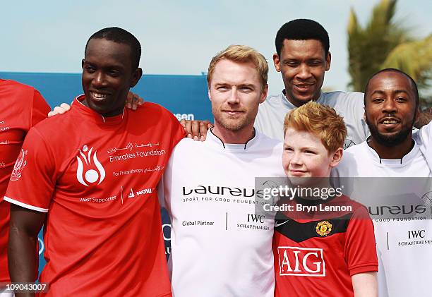 Dwight Yorke, Ronan Keating with his son Jack, Mohamed Abdullaziz Al-Deayea and Ismail Matar during the Laureus Football Challenge presented by IWC...