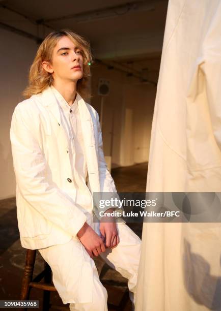 Model poses at the Omar Afridi presentation at the DiscoveryLAB during London Fashion Week Men's January 2019 at the BFC Designer Showrooms on...